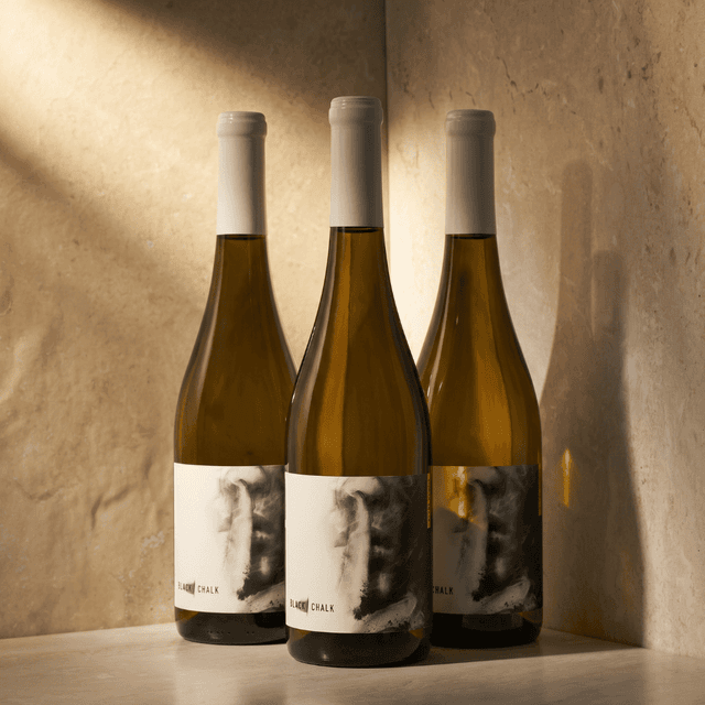 image of Three bottles of Rumour Has It Chardonnay