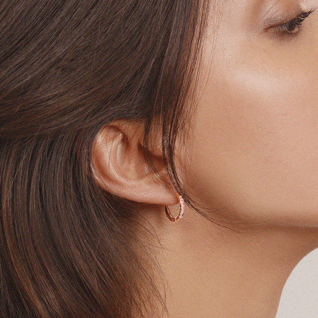 image of Huggie hoop earrings